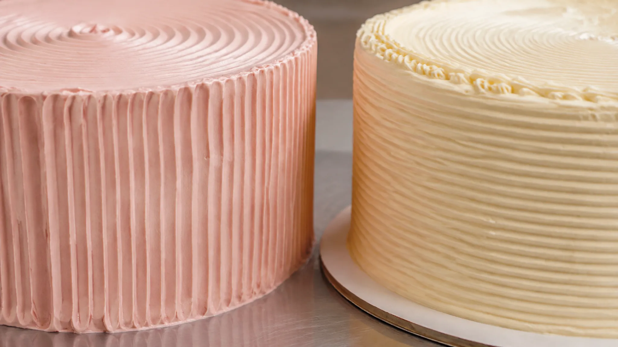 Close view of ridged and combed cake finish patterns with varied spacing