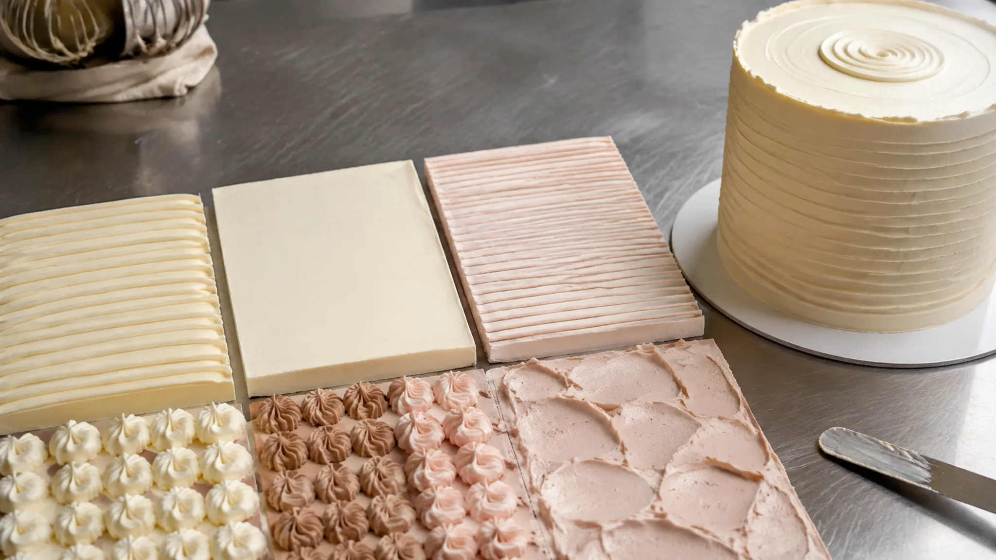 Close inspection view for judging cake finish spacing, edge treatment, and surface variation